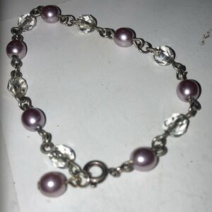 Cheap Bracelet but pretty Faux Pearls and Silver Metal  Embellishments